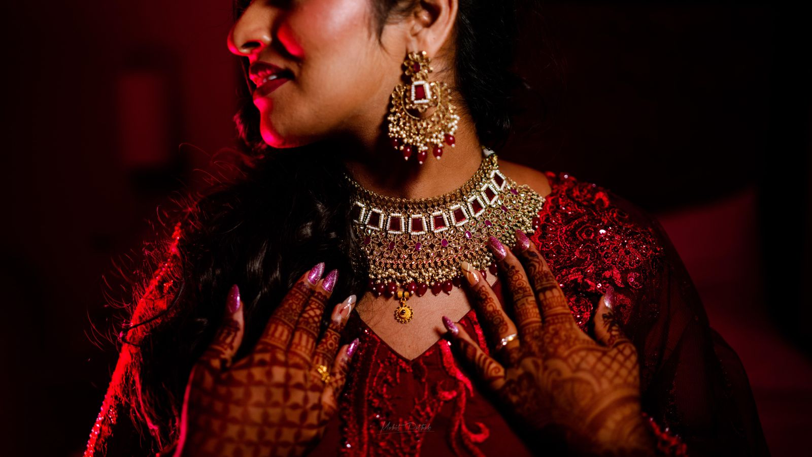 Close image of jewelry under red light