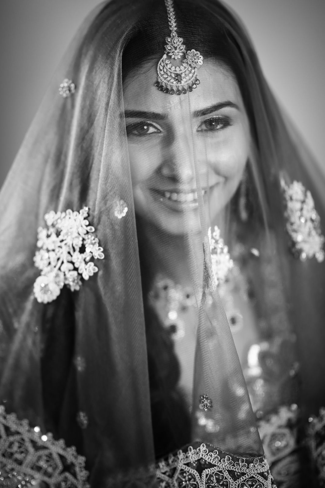 Bride portrait behind a veil